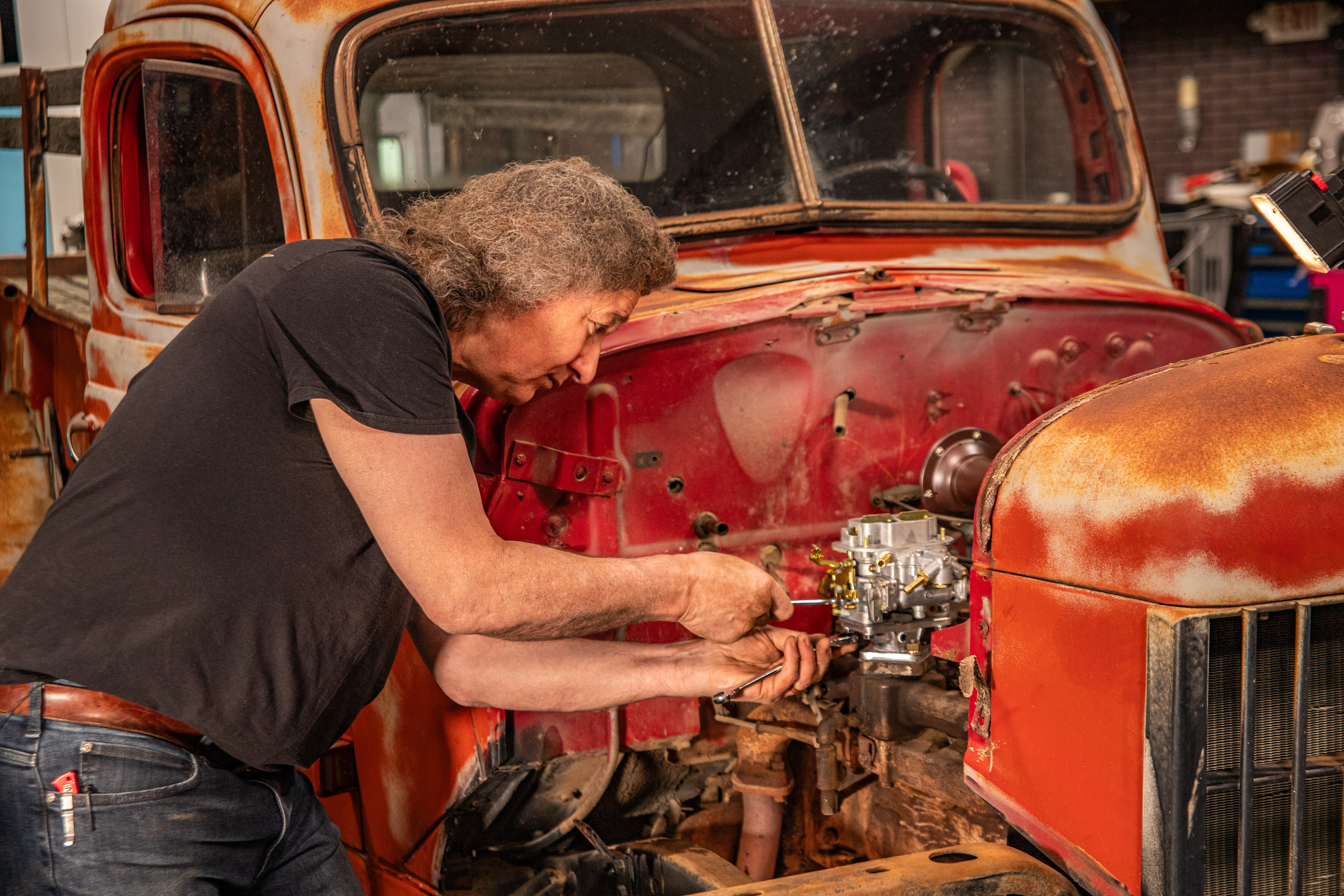 Stacey works on the new carburetor